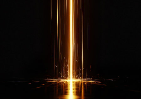 An intense column of golden energy descends onto a glossy black floor, creating a brilliant explosion of fiery sparks and a stunning, luminous reflection.の素材