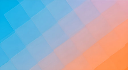 A modern abstract background showcasing a smooth gradient from cool blue to warm orange, subtly textured with overlapping geometric squares.の素材