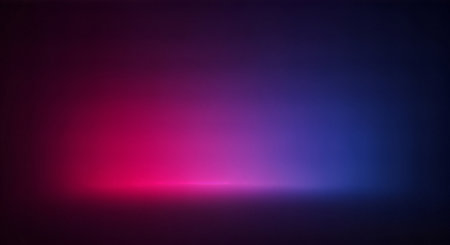 Abstract gradient background featuring a smooth transition from vibrant pink to deep blue, creating a luminous effect against a dark backdrop. Modern, digital, and visually striking.の素材