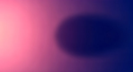 A smooth, abstract gradient background featuring a blend of pink, purple, and deep blue hues. The colors transition seamlessly, creating a soft, textured effect. The composition is simple yet visually appealing, with a focus on color and form.の素材