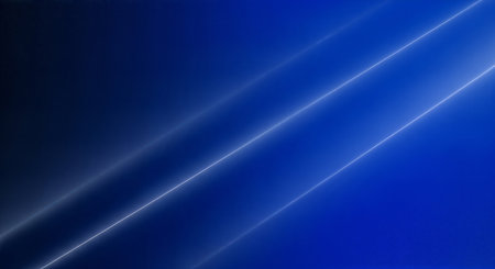 A modern abstract background featuring a smooth gradient from deep navy to electric blue, crossed by two sharp, glowing diagonal lines suggesting speed and technology.の素材