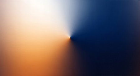 A striking abstract background with a sharp conical gradient. Warm, radiant orange transitions into deep, cool navy blue, creating a powerful sense of depth and focus.の素材