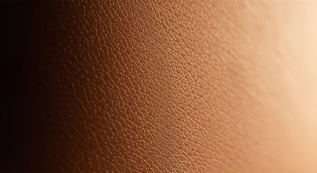A detailed close-up of a brown leather texture with a rough surfaceの素材