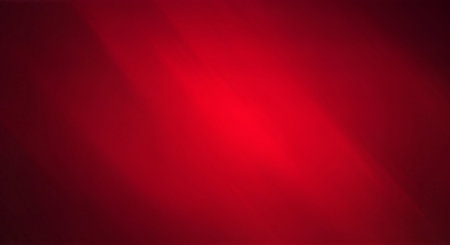 A bright red abstract background with a light source creating a gradient effectの素材