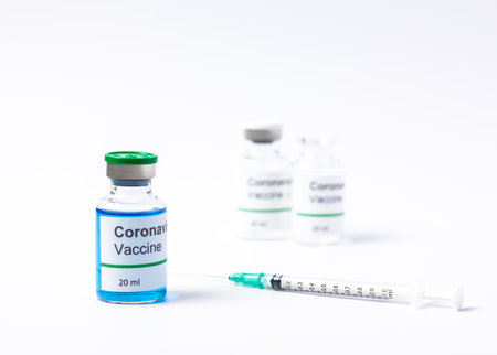 Covid-19 Coronavirus Vaccine and Syringe