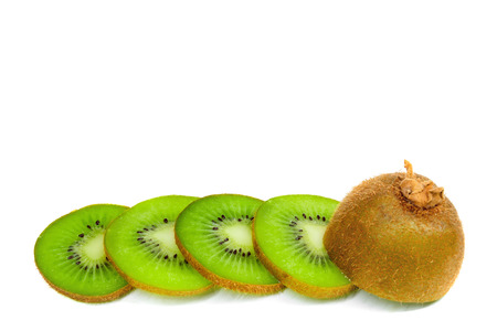 Kiwi fruit chopped slices isolated on white backgroundの写真素材