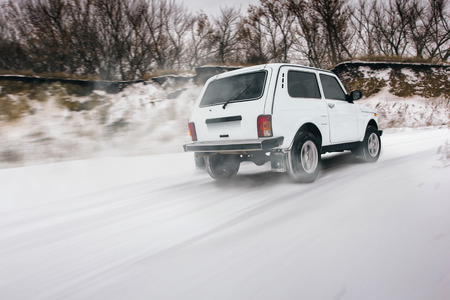 Car fast drive on the snowy roadのeditorial素材