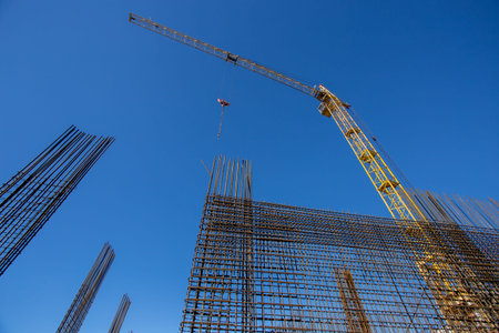 Crane construction concrete building in city