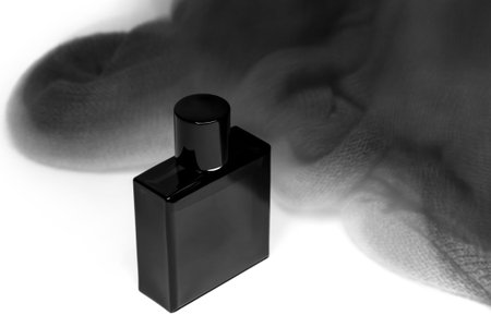 Bottle of men perfume and gray scarfの写真素材