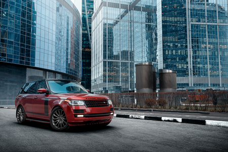 Moscow, Russia - November 22, 2015: Premium car Land Rover Range Rover stay near modern building in the city at daytimeのeditorial素材
