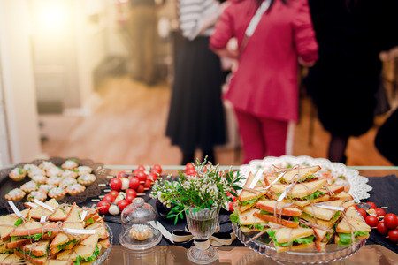 Tasty food on table at the reception banquetの写真素材