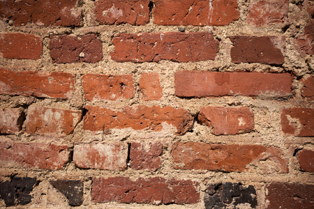 Old red grunge brick wall texture backgroundのeditorial素材