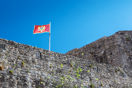 Flag of Montenegro in Budva old town citadelのeditorial素材