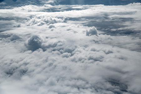 White clouds, view from above air plane windowの写真素材