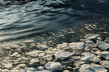 Ice drift melting at daytime. Spring backgroundの写真素材