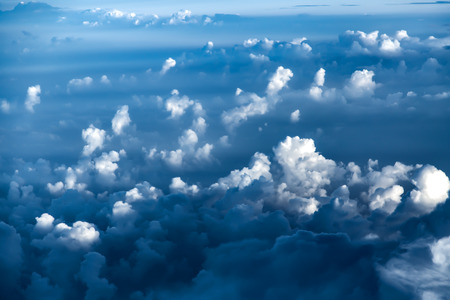 White clouds, view from above air plane windowの写真素材
