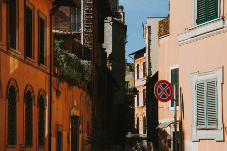 Narrow street in Rome, Italy at summerの写真素材