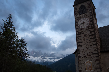 Beautiful green meadow at dusk. Dolomites Italian Alpsの写真素材