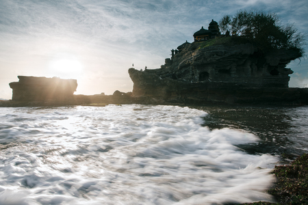 Tanah Lot temple in Bali, Indonesia at sunset. National landmark, famous touristic placeの写真素材