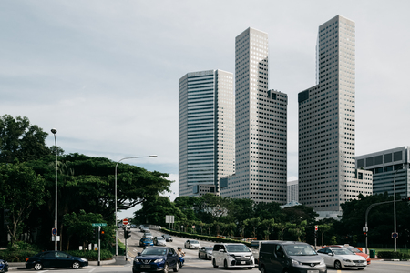 Singapore, Singapore - October 14, 2017: Central street in downtown district at Singapore city at sunny day. Cars on the roadのeditorial素材