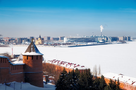 Kremlin wall and Spit (Strelka) of Nizhny Novgorod city in Russia at winter. Confluence of the Oka and Volga riversの写真素材