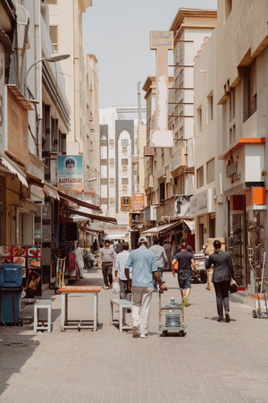Dubai, UAE - September 09, 2018: People are walking on the street at Al Ras district. Deira, Dubaiのeditorial素材