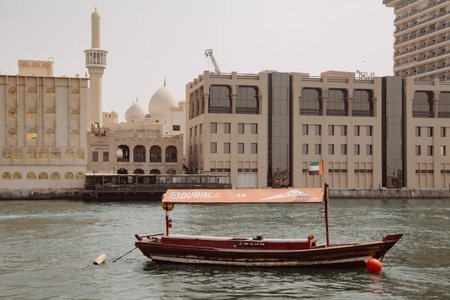 Dubai, UAE - September 09, 2018: Excursion boats on the Dubai Creek near old town Al Fahidi district