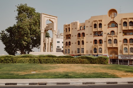 Dubai, UAE - September 09, 2018: Buildings and monument at Fahidi districtのeditorial素材