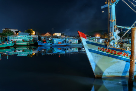 Phu Quoc, Vietnam - December 11, 2018: Fishing boats on the river near Phu Quoc Night Market in Vietnamのeditorial素材