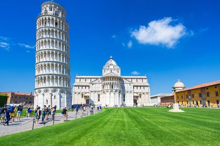 View of the Leaning Tower and the Pisa Cathedral in sunny day, Italyの写真素材
