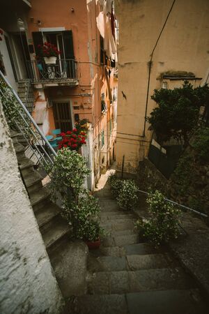 Narrow streets in Riomaggiore town at Cinque Terre, Italy in the summerの写真素材