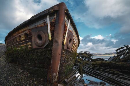 Abandoned ships cemetery at low tide near Teriberka village in Murmansk Region. Kola peninsula, Northern Russiaの写真素材