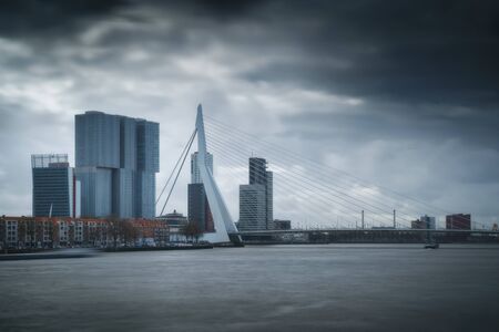 Rotterdam city skyline cityscape, Netherland (Holland). View of downtown and Erasmus bridgeの写真素材