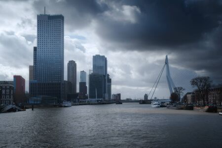 Rotterdam city skyline cityscape, Netherland (Holland). View of downtown and Erasmus bridgeの写真素材