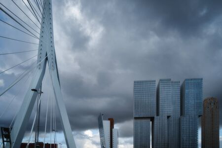 Rotterdam city skyline cityscape, Netherland (Holland). View of downtown and Erasmus bridgeの写真素材
