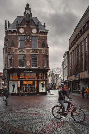 Utrecht, Netherlands - March 8, 2020: People are walking on the street in Utrecht city center old townのeditorial素材