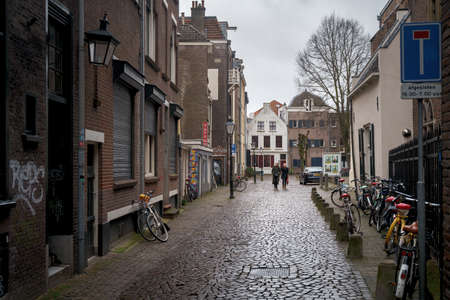 Utrecht, Netherlands - March 8, 2020: People are walking on the street in Utrecht city center old townのeditorial素材