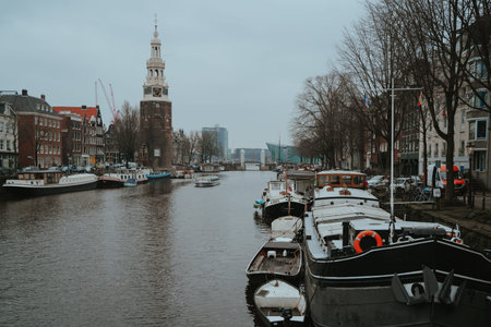Amsterdam, Netherlands - March 7, 2020: People are walking on the street in Amsterdam city center old townのeditorial素材