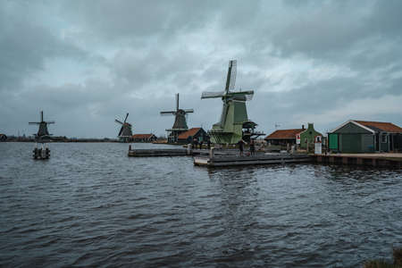 Zaandam, Netherlands - March 6, 2020: Windmills in Zaanse Schans in Zaandam city. Museum village in Netherlands (Holland)のeditorial素材