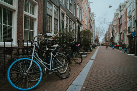 Amsterdam, Netherlands - March 7, 2020: People are walking on the street in Amsterdam city center old townのeditorial素材