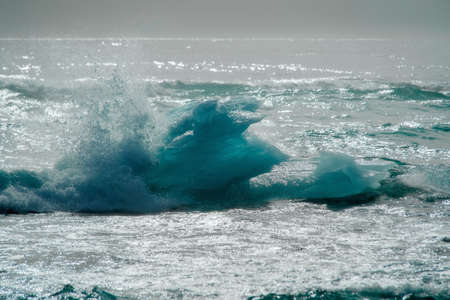Diamond Beach (Jokulsarlon) landscape in East Iceland. Ice on black volcanic sand in the dayの写真素材