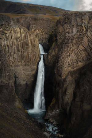 Litlanesfoss waterfall and basalt columns in East Icelandの写真素材