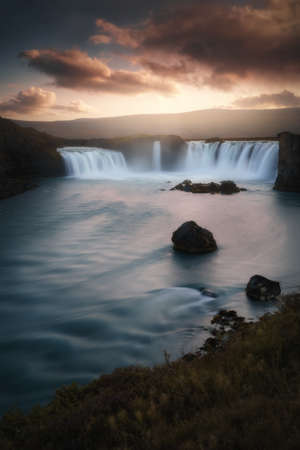 Godafoss waterfall in Northeast Iceland. Beautiful nature icelandic landscape at sunsetの写真素材