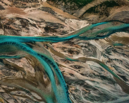 Aerial drone view of melting glacier river water in South Iceland. Abstract nature backgroundの写真素材