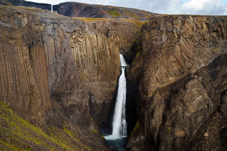 Litlanesfoss waterfall and basalt columns in East Icelandの写真素材