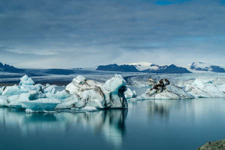 Jokulsarlon Glacier Lagoon in East Iceland. Iceberg on the water. Long exposure effectの写真素材