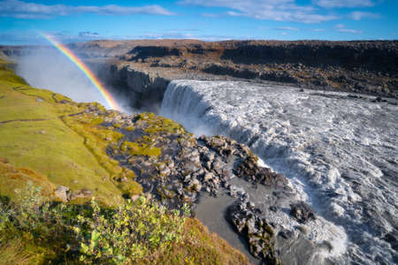 Rainbow at Dettifoss waterfall in Northeast Iceland. Beautiful nature icelandic landscapeの写真素材