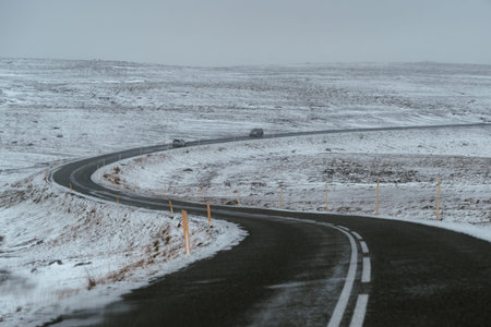 Drive car on road. Iceland travel. View from the inside. Snow icelandic landscapeの写真素材