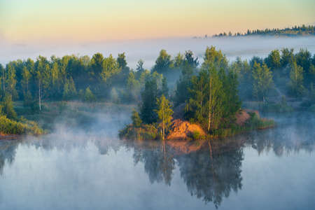 Morning fog on the water in Konduki, Tula oblast, Russia. Nature landscapeの写真素材