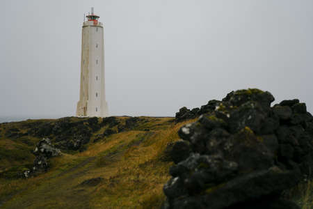 Malarrif lighthouse on the cliff near the ocean in Western Iceland. Snaefellsnes (SnÃ¦fellsnes) peninsulaの写真素材